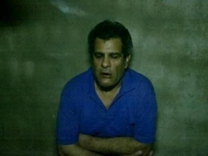 (Image source: AFP PHOTO / HO / AL-NUSRA FRONT) Mohammed al-Saeed, the TV presenter executed