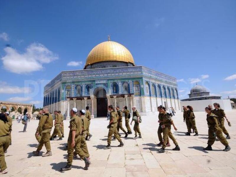 The director of Al Aqsa Mosque told reporters that approximately 1,000 Israeli officers stormed the compound Wednesday (File Archive/AFP)