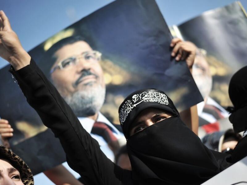 Morsi called on the Egyptian people to continue their revolutionary efforts, as he told the court that he is still the legitimate president of Egypt. (AFP/File)