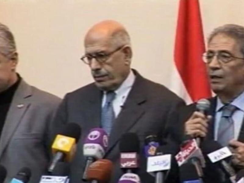 Egyptian politicians Hamdeen Sabahy (L), Mohamed ElBaradei (C) and Amr Moussa (R) speaking at the opposition alliance’s conference. (Al Arabiya)