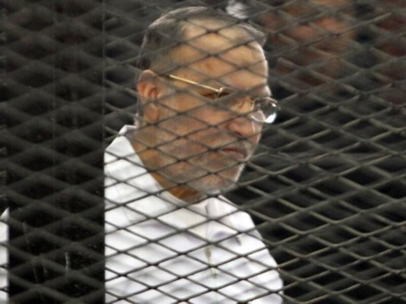 Mohammed Badie along with 34 co-defendants, such as Essam Al Eryan, are on trial for protest killings and inciting violence during the June 30 demonstrations (Maher Iskander/AFP)