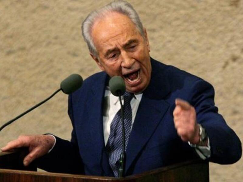Israel's President Shimon Peres hailed Palestinian leader Mahmoud Abbas' commentary from Sunday on right of return and Jerusalem as a sign of seriousness about reaching peace (File Archive/AFP)