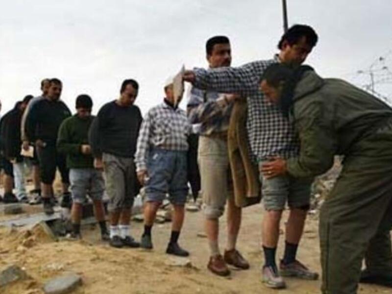 Palestinian workers wait to enter the Israeli industrial zone next to the border with Gaza (picture courtesy of B'Tselem)