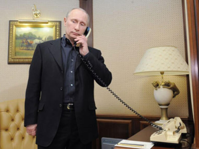 Russian president Vladimir Putin telephoned Iran's president Hassan Rouhani Monday two days ahead of talks in Geneva on Tehran's nuclear program (AFP/Getty Images)