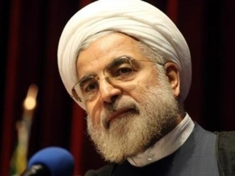 Iranian President Hassan Rouhani has implied that if the West lifts all sanctions on the Islamic Republic, Iran will shut down one of its nuclear facilities. (AFP/File)
