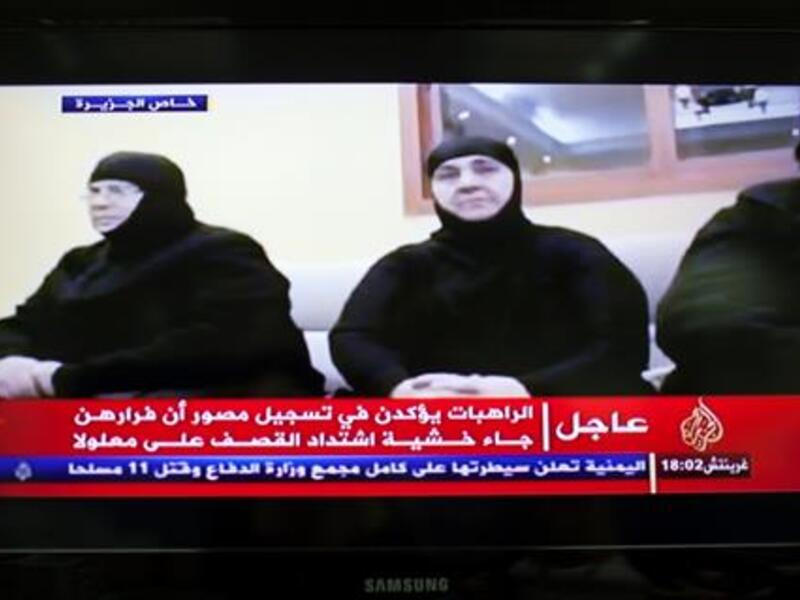 The abducted Syria nuns appeared on television Dec. 6 (Courtesy of the Daily Star/Al-Jazeera TV)