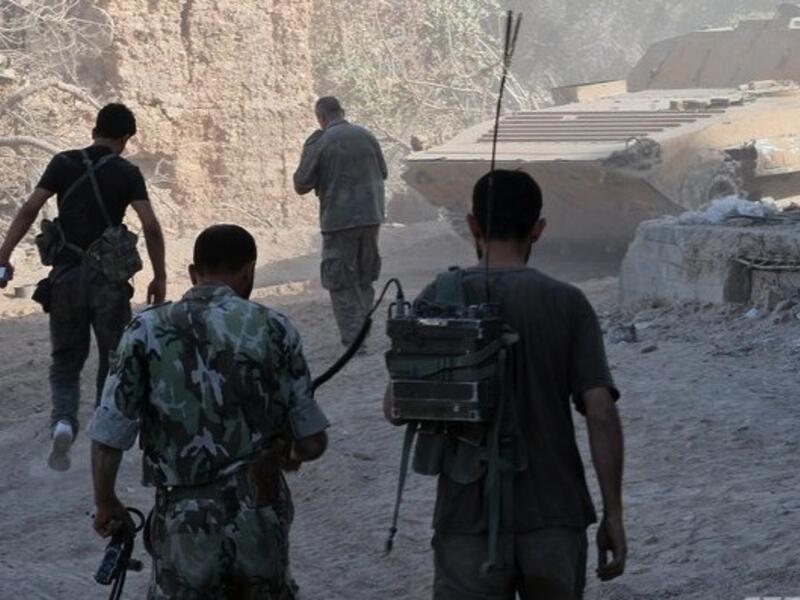 The opposition fighters were attempting to flee into nearby Lebanon, AFP reported. (AFP)