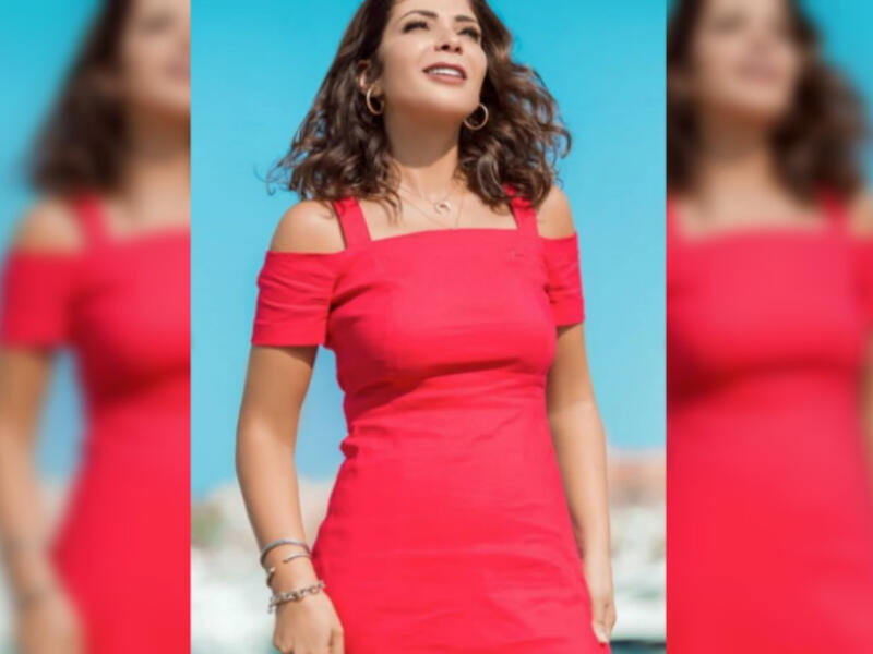 Mona sported a short red dress off shoulder dress for her latest photo shoot