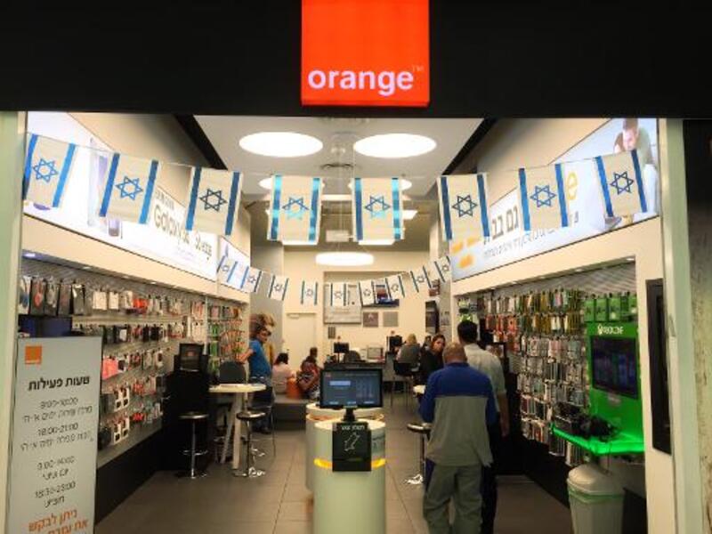 Partner Communications will cease to use the Orange name within 24 months, the companies announced Tuesday. (AFP/Thomas Coex)