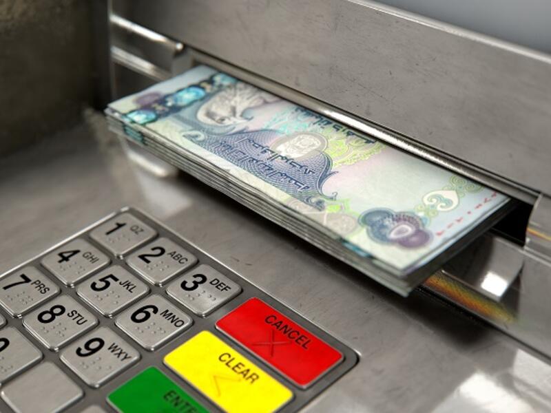 The proposed merger, pending approvals by the banks' boards of directors, shareholders and regulators, would be credit positive for UAE banks. (Shutterstock)
