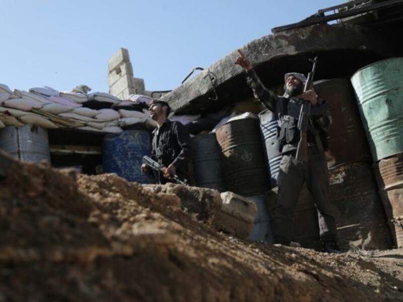 Rebel fighters in Ghouta, February 2016 (AFP/Amer Almohibany)