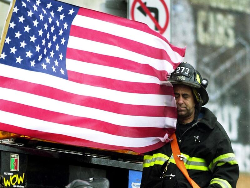A firefighter at 'Ground Zero', three days after the attack. (AFP / Tannen Maury)
