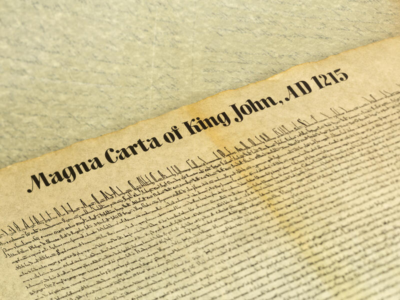 Magna Carta Libertatum, is an eight-hundred year-old English legal charter that required King John of England to proclaim certain rights and accept that his will could be bound by the law. (Shutterstock)