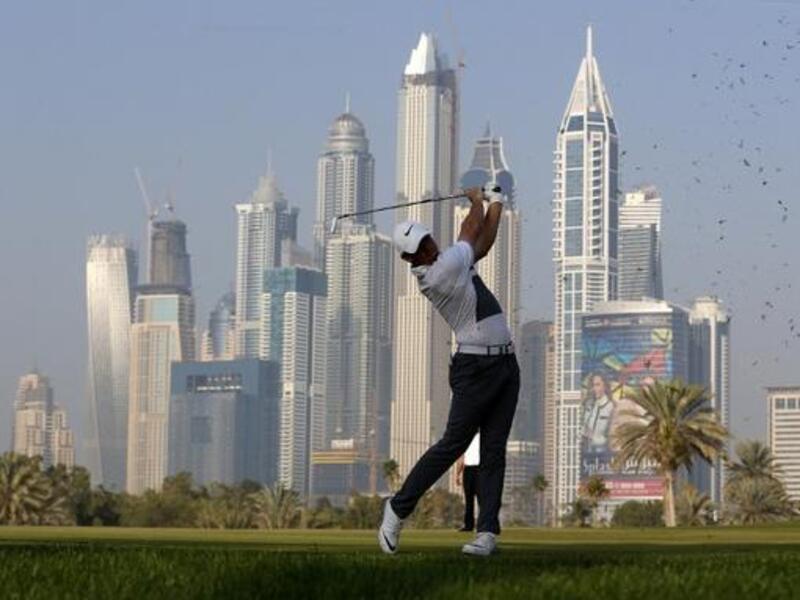 Rory McIlroy of Northern Ireland plays his third shot during the first round of the 2016 Dubai Desert Classic at the Emirates Golf Club on February 4, 2016 in Dubai. 