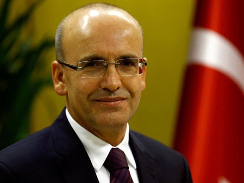 According to Turkey's Deputy Prime Minister Mehmet Simsek, the US-Turkey visa row is only a temporary dispute that will be resolved soon. (AFP)
