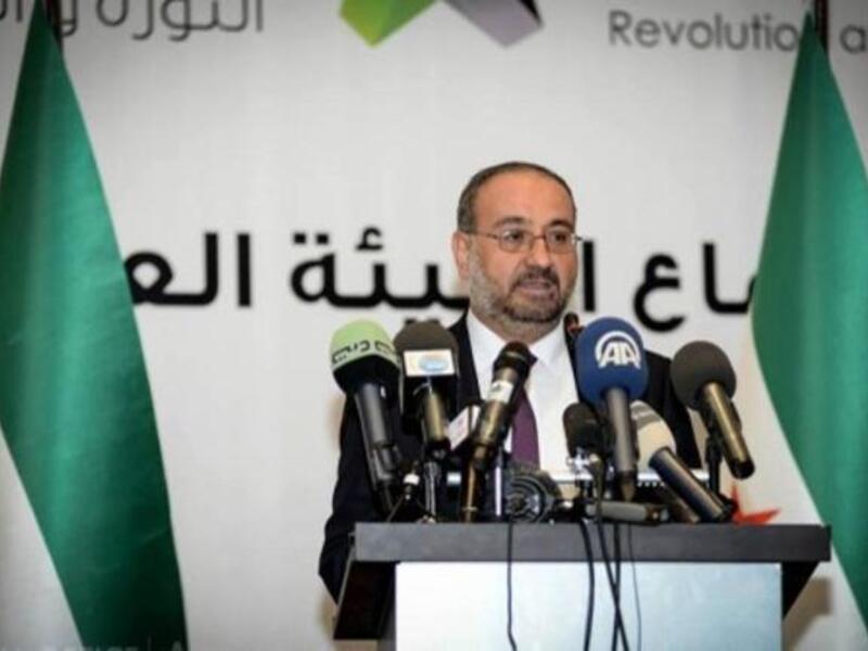 Ahmad Tuma, the leader of the SNC "does not represent us," according to the Free Syrian Army and 12 other opposition groups Wednesday (AFP)