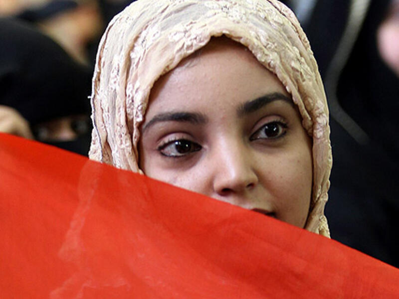 A woman attends a demonstration in Yemen's capital city Sanaa.  (AFP/File)