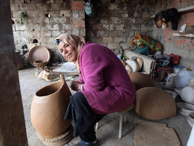 Sabiha Ayari, a Tunisian potter in her fifties, works in the village of Sejnane in the northern Tunisian province of Bizerte, about 120 kilometres (75 miles) west of the capital Tunis.  FETHI BELAID / AFP
