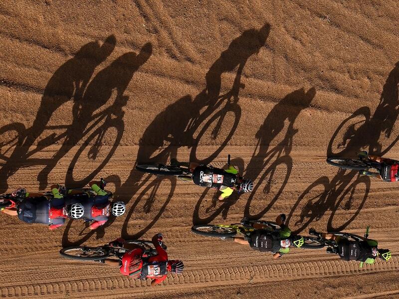 Competitors ride their bikes during Stage 4 of the 14th edition of Titan Desert 2019 mountain biking race between Merzouga and M’ssici, in Morocco, on May 1, 2019.  FRANCK FIFE / AFP