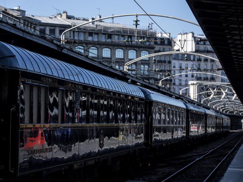 This picture taken on May 13, 2019 shows a restored Orient Express train displayed at the Gare de l'Est train station in Paris.  Christophe ARCHAMBAULT / AFP