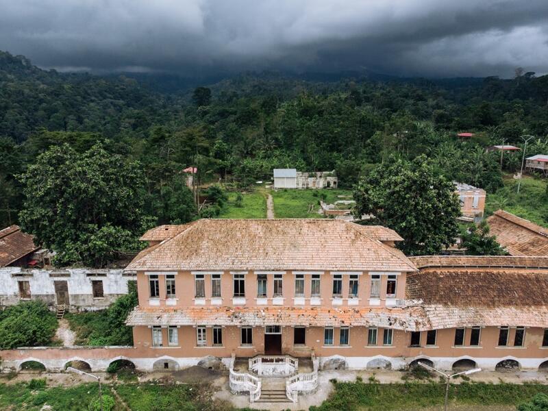 A picture taken on May 12, 2019 shows an aerial view of the hospital of the roca Agostinho Neto, an abandoned cocoa plantation of Sao Tome and Principe.  Alexis HUGUET / AFP