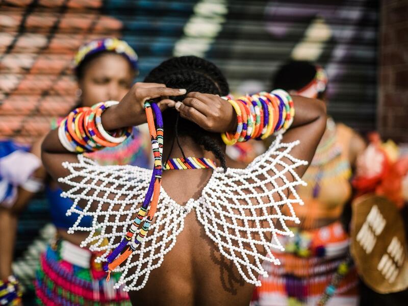 Young women dress up in traditional attire before taking part in auditions organised by the Indoni Culture School in the South African city of Durban. Rajesh JANTILAL / AFP