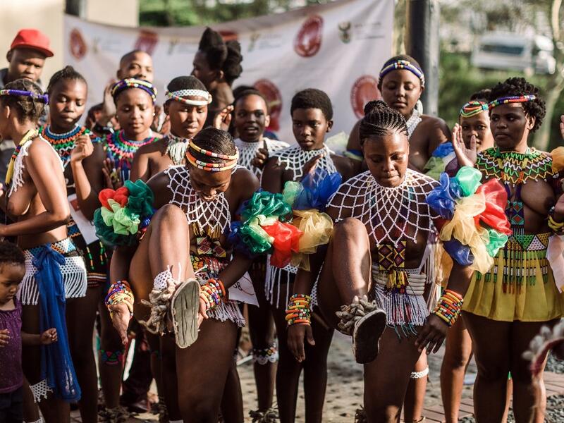 Young women dressed up in traditional attire sing and chant during an audition organised by the Indoni Culture School in the South African city of Durban. Rajesh JANTILAL / AFP