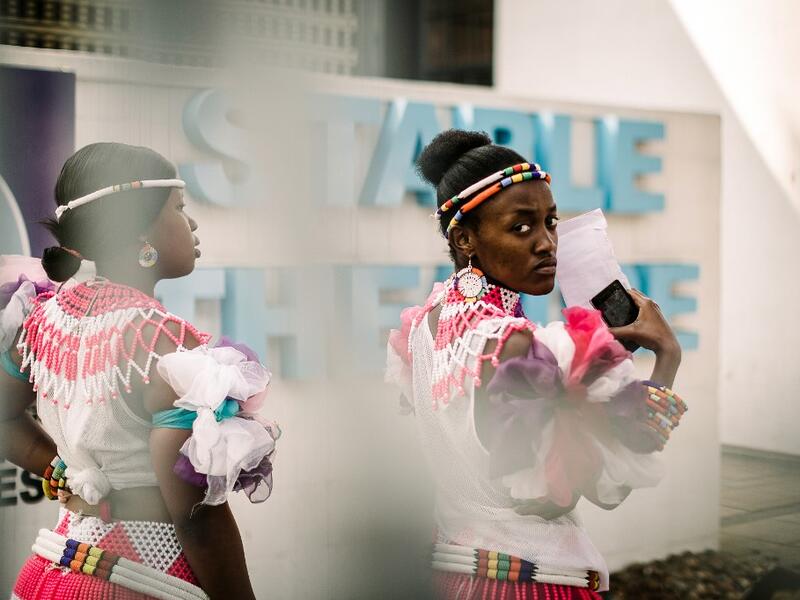 Young women dressed up in traditional attire wait for an audition organised by the Indoni Culture School in the South African city of Durban. Rajesh JANTILAL / AFP