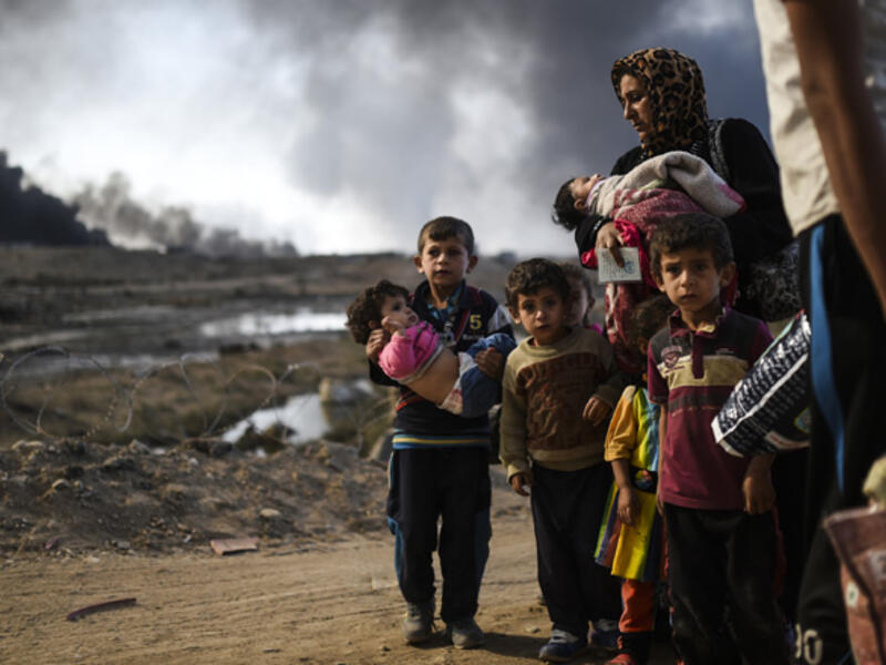 Some of the Iraqi people being displaced in their homes in Nineveh province. /AFP Some of the Iraqi people being displaced in their homes in Nineveh province. /AFP