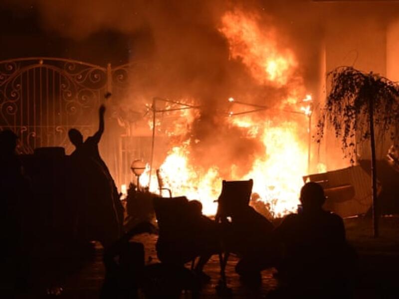 Supporters of the former Kyrgyzstan president Almazbek Atambayev clash with special forces outside his home. Photograph: Vyacheslav /AFP Supporters of the former Kyrgyzstan president Almazbek Atambayev clash with special forces outside his home. Photograph: Vyacheslav /AFP
