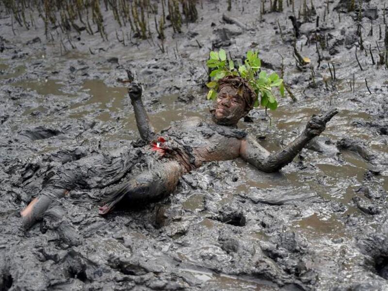 In Pictures: The Balinese Mud Bath Tradition of Mebuug-Buugan