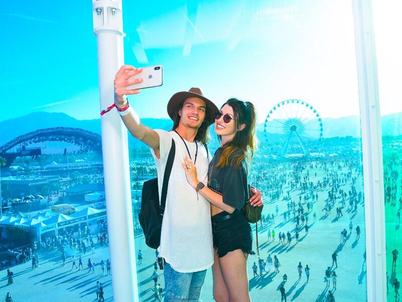 Festival goers attend the 2019 Coachella Valley Music And Arts Festival - Weekend 2 on April 21, 2019 in Indio, California. Presley Ann/Getty Images for Coachella/AFP