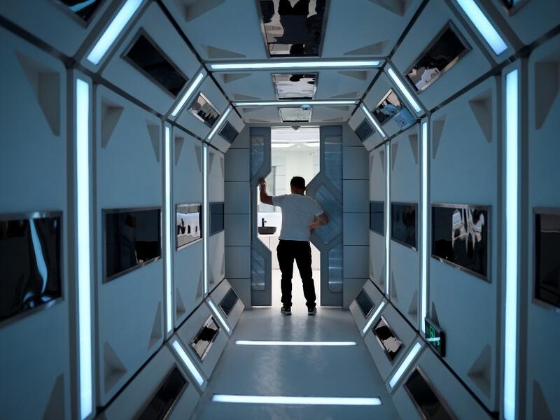 A man visits "Mars Base 1", a C-Space Project, in the Gobi desert, some 40 kilometres from Jinchang in China's northwest Gansu province on April 17, 2019. WANG ZHAO / AFP