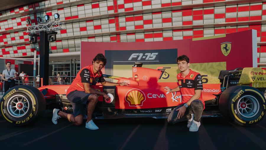 Scuderia Ferrari F1 drivers Charles Leclerc and Carlos Sainz surprise guests at the Ferrari World Abu Dhabi F1 FanZone 