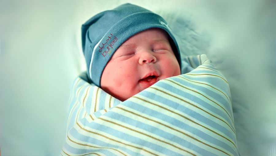 Baby Humam, born to Jordanian parents, arrived exactly at 12:00 AM on the special day