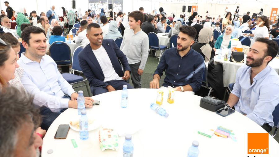 A vibrant and engaging atmosphere during Orange Jordan’s Family Day for employees