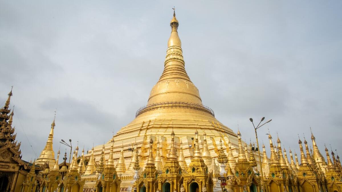 Buddhist devotees visit Shwedagone pagoda during Buddha's birthday which falls on the Full Moon Day of Kasone in Yangon on May 18, 2019.  Sai Aung MAIN / AFP