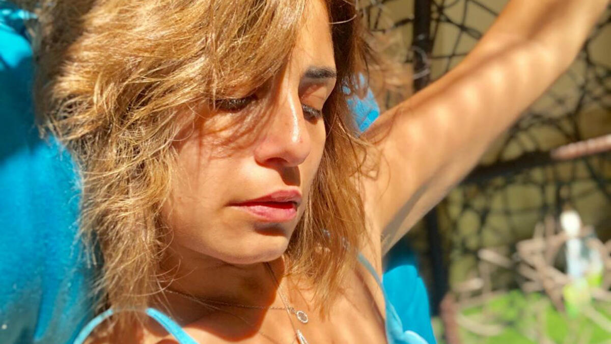 Egyptian actress Minna Fadali also posts her pictures in swimsuits yet cropped and she also posts pictures in short clothes causing a wave of criticism Source manoushafadali Instagram