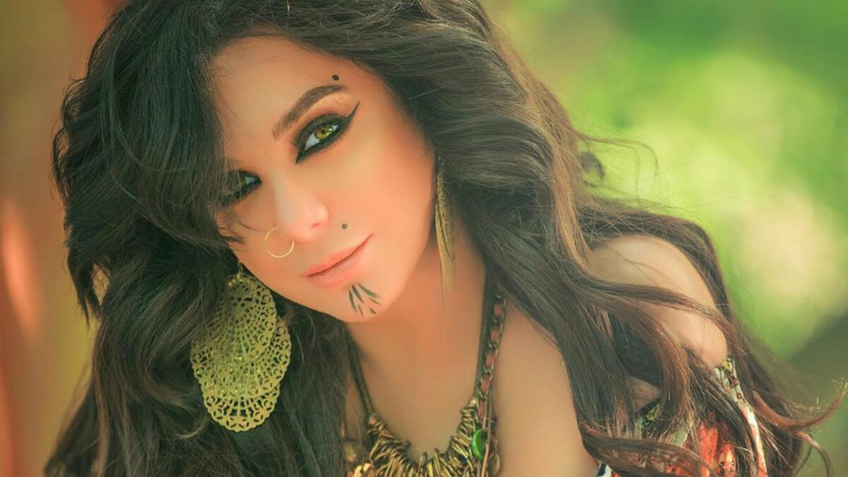 In her latest photos Fawakherji appeared in bright colored clothes and wavy hair Source sulaffawakherji Instagram