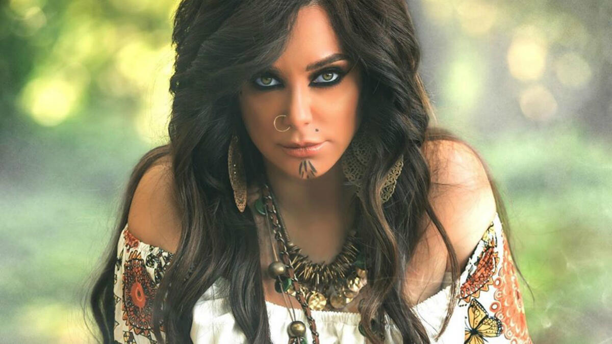 In her latest photos Fawakherji appeared in bright colored clothes and wavy hair Source sulaffawakherji Instagram