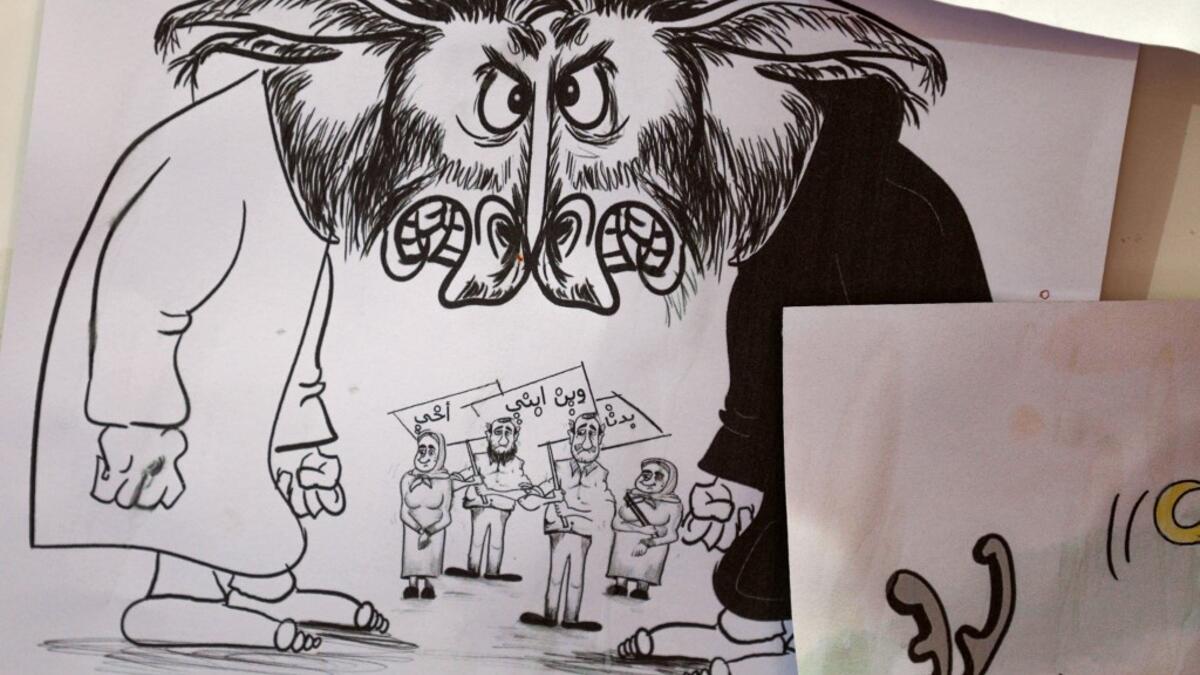 In war-torn northwest Syria, cartoonist Amani al-Ali takes her pen to the screen to sketch life in the embattled opposition bastion of Idlib. Through her cartoons, Ali has boldly challenged traditions to comment on life in the anti-regime bastion, and to condemn seeming international indifference to civilian deaths. Omar HAJ KADOUR / AFP