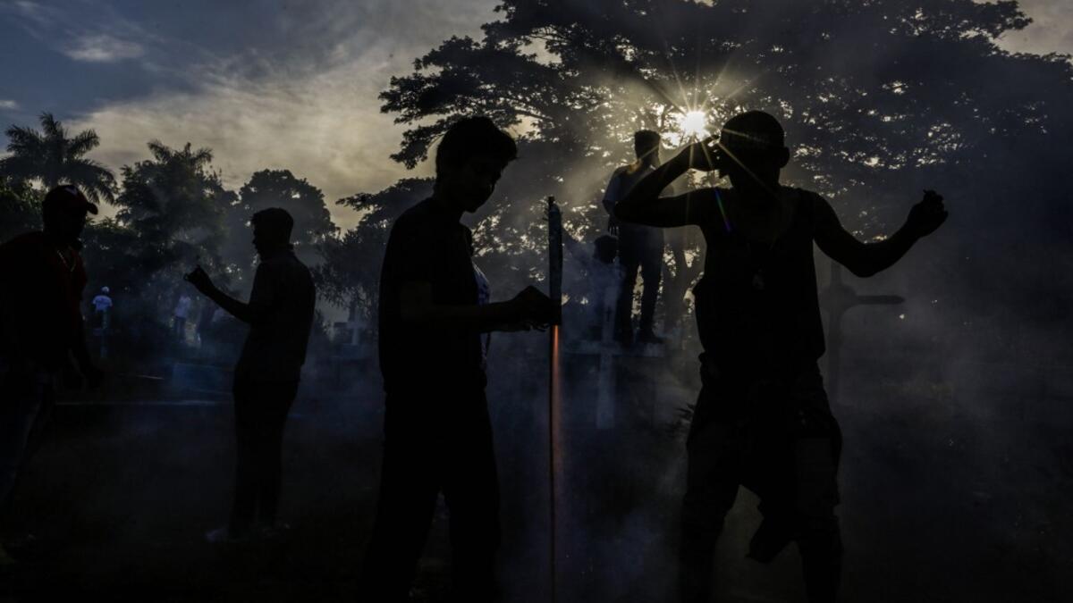 Catholic faithful light fireworks, during the opening of the ten-day celebration of the Santo Domingo de Guzman festival in Managua, on August 1, 2019.  INTI OCON / AFP