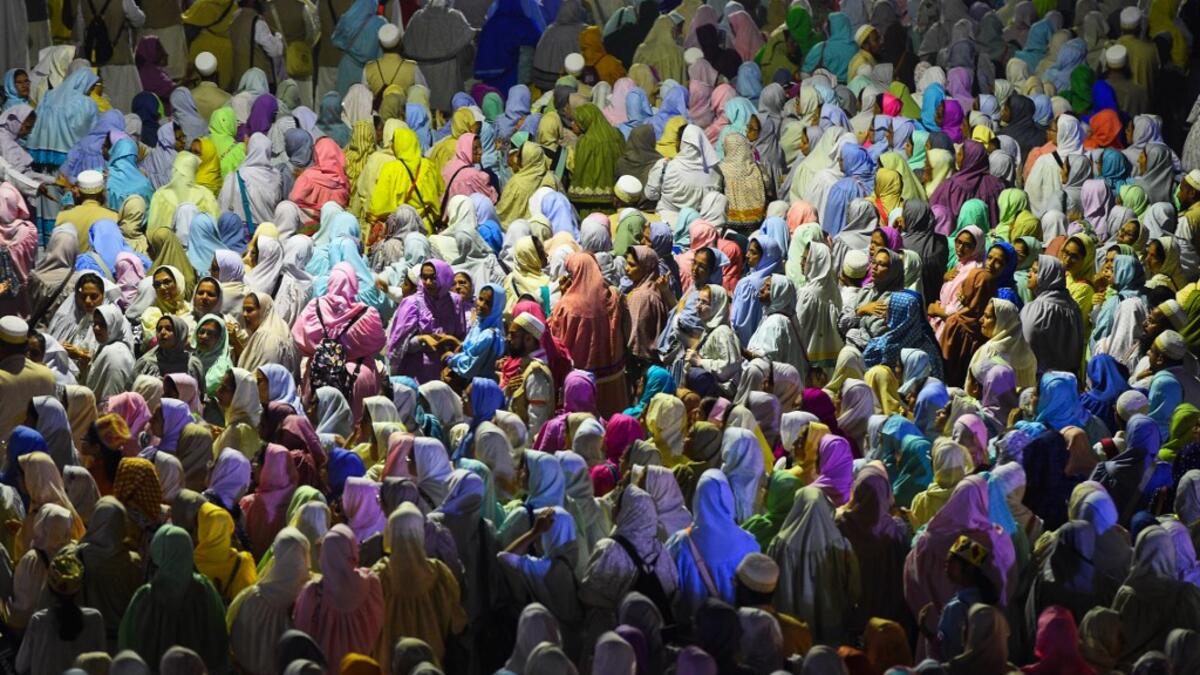 Muslim women pilgrims of the Dawoodo Bohra community take part in a Bohra ceremony in Colombo, in the run up to Ashura, one of the holiest days in Shiite Islam and commemorates the 7th century martyrdom of Prophet Mohammed’s grandson.  ISHARA S. KODIKARA / AFP