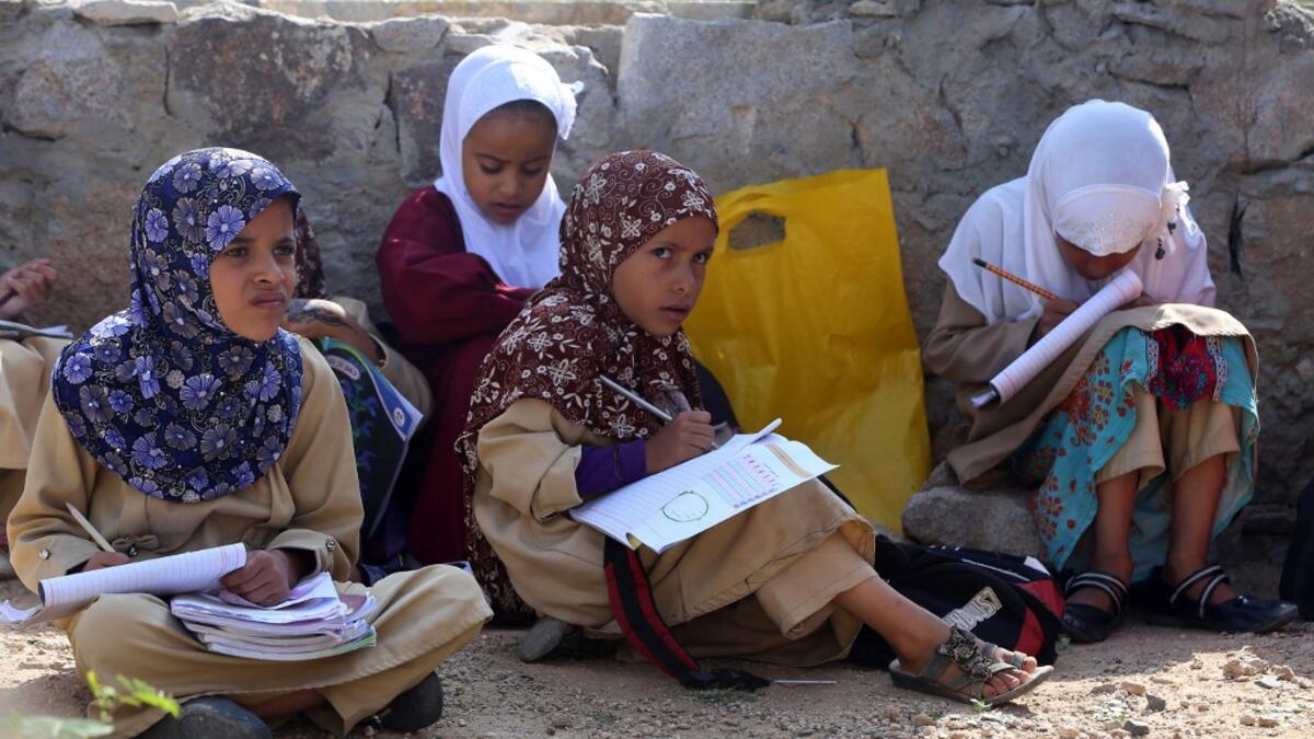 Yemeni school children attend an open-air class at their unfinished school in the southwestern Yemen Ahmad AL-BASHA / AFP