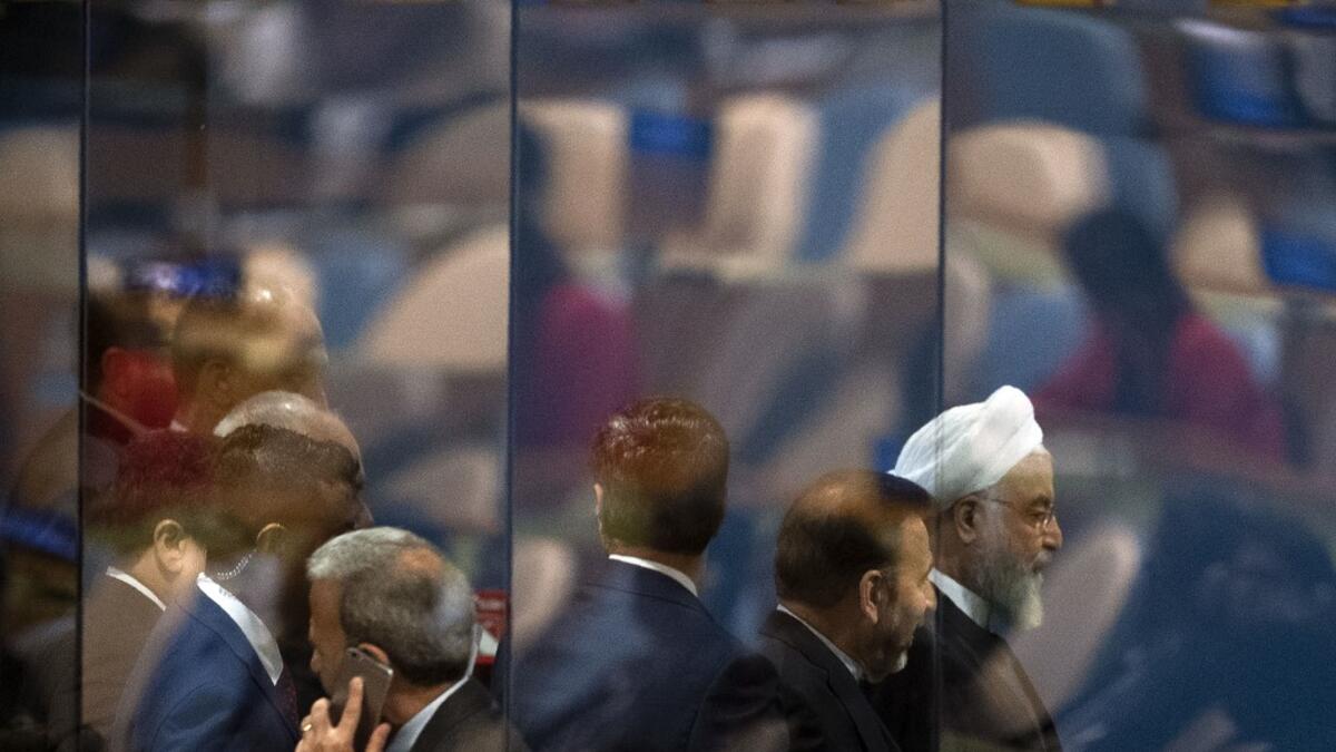 Iranian President Hassan Rouhani leaves the 74th Session of the General Assembly during the United Nations General Assembly September 25, 2019.  Don Emmert / AFP