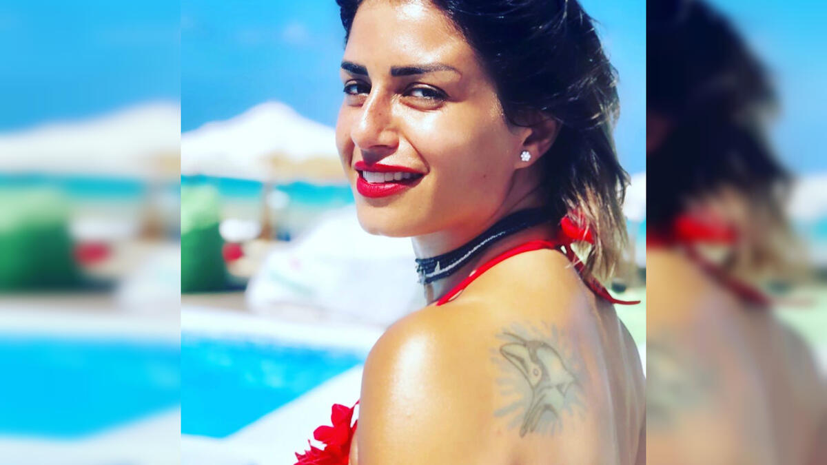 Menna enjoying her time by the pool side source @manoushafadali instagram
