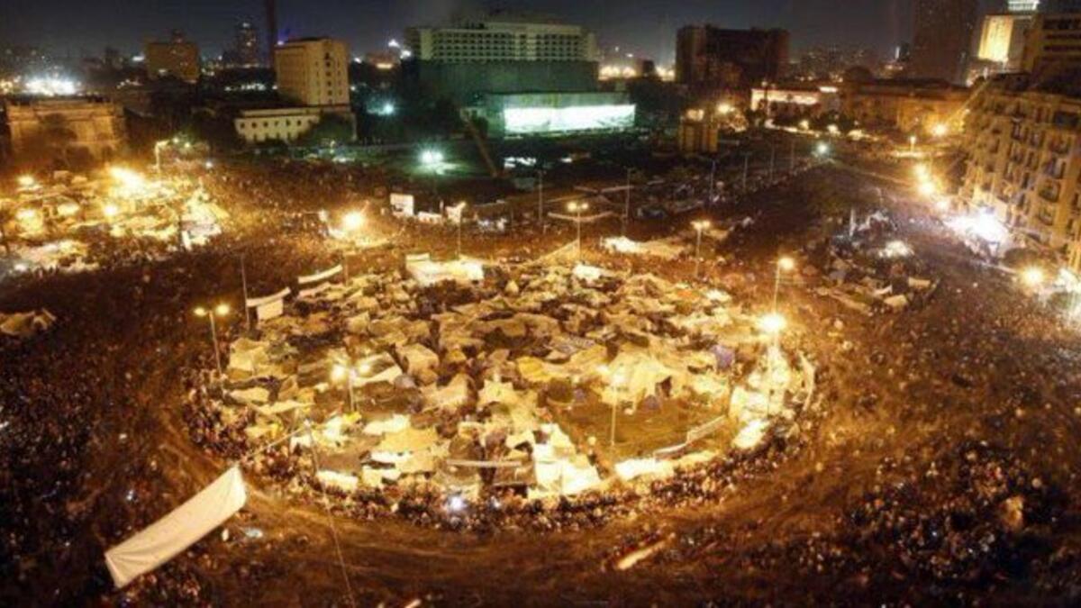 Egyptian protesters shout slogans as they take part in a protest calling for the removal of President Abdel Fattah al-Sisi in Cairo's downtown on September 20, 2019. Twitter