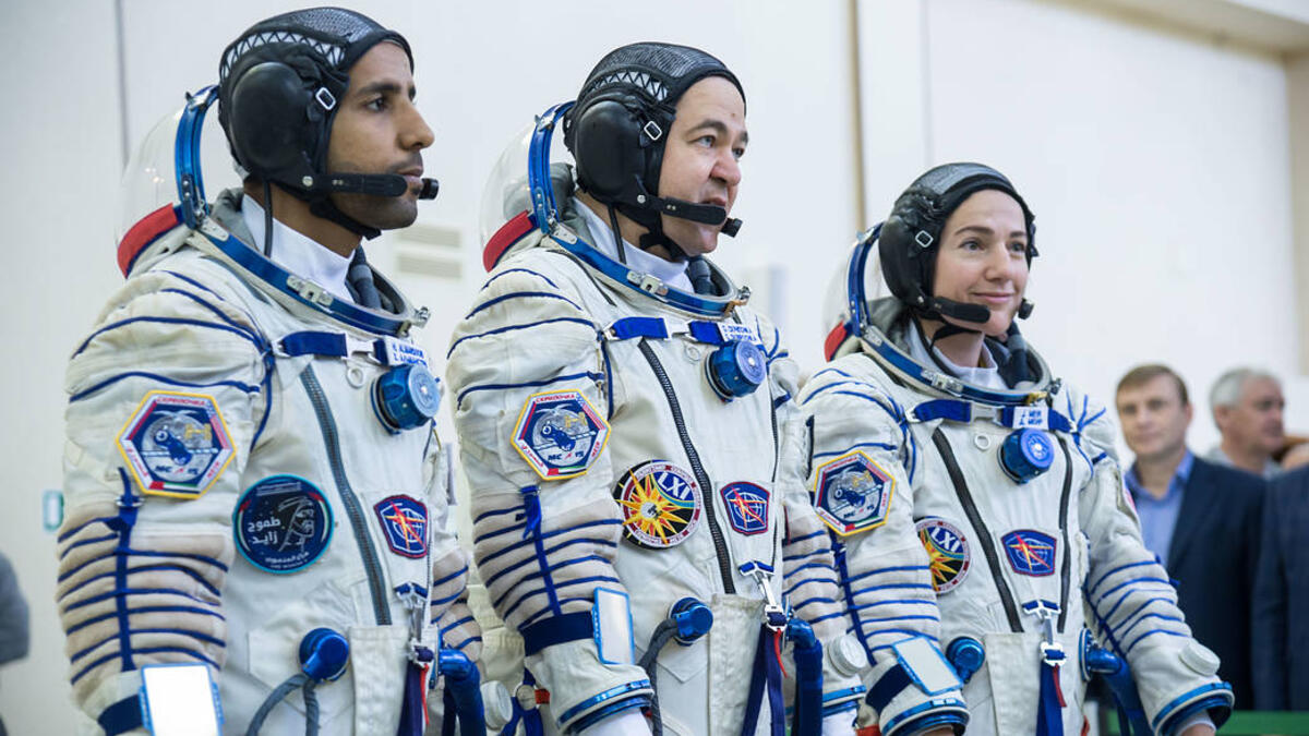 At the Gagarin Cosmonaut Training Center in Star City, Russia, spaceflight participant Hazzaa Ali Almansoori of the United Arab Emirates (left), Oleg Skripochka of Roscosmos (center) and Jessica Meir of NASA (right). (mage: NASA/Beth Weissinger)