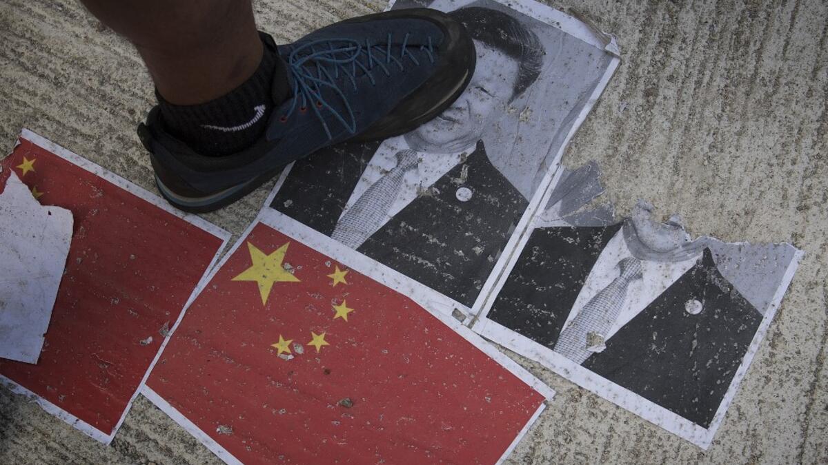 Strife-torn Hong Kong on October 1 marked the 70th anniversary of communist China's founding with defiant "Day of Grief" protests and fresh clashes with police as pro-democracy activists ignored a ban and took to the streets across the city. Mark RALSTON / AFP