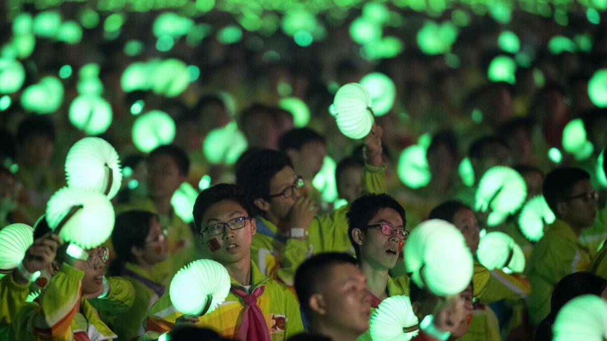 Chinese dancers perform at a gala in Tiananmen Square in Beijing on October 1, 2019, to mark the 70th anniversary of the founding of the People’s Republic of China. NOEL CELIS / AFP